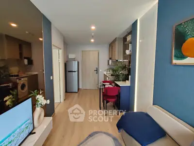 Modern living room with open kitchen and stylish decor