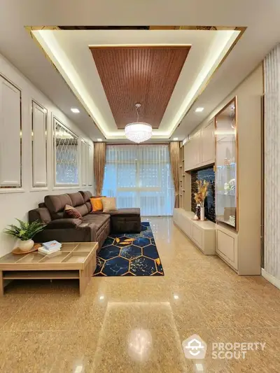 Elegant living room with polished marble flooring, luxurious wooden ceiling design, and modern furnishings, creating a warm and inviting ambiance.