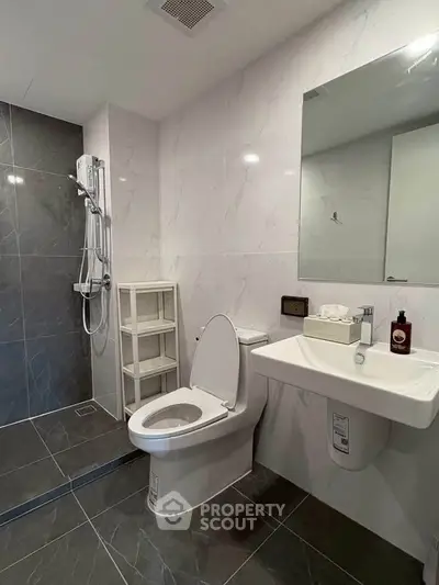 Modern bathroom with sleek fixtures and elegant tile design