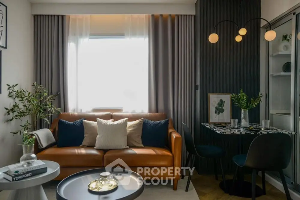 Stylish modern living room with leather sofa and chic decor