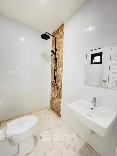 Modern bathroom with sleek shower and minimalist design