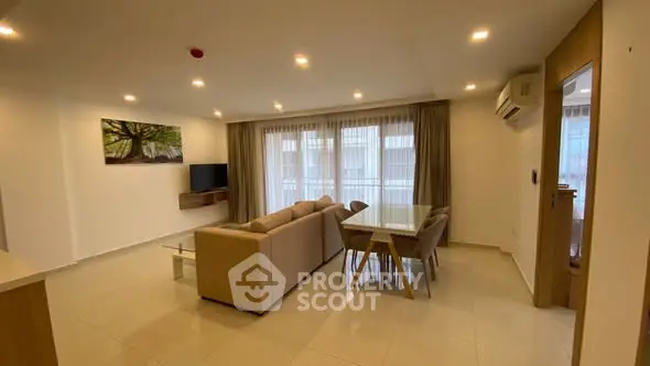 Spacious modern living room with elegant decor and natural light