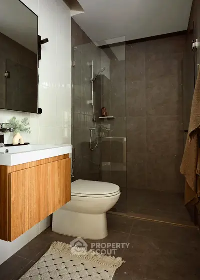 Modern bathroom with sleek design and glass shower enclosure