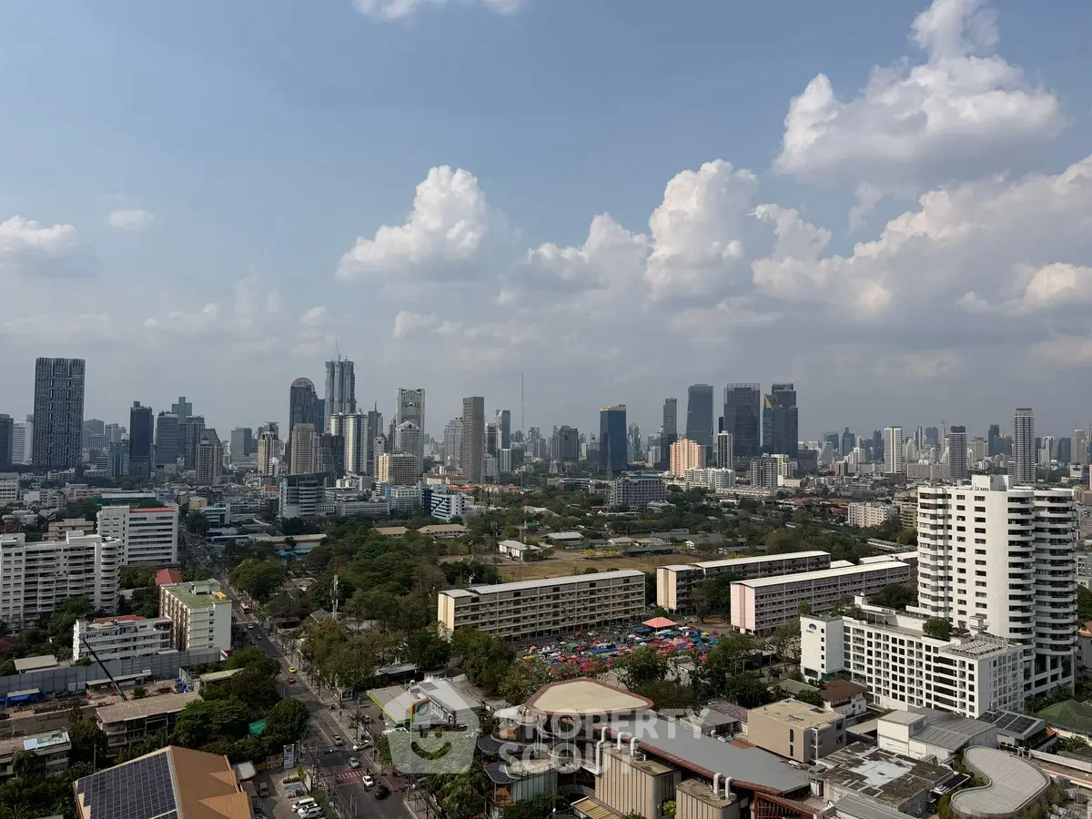 Stunning cityscape view showcasing a vibrant urban skyline with modern skyscrapers and lush greenery.