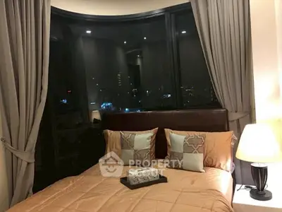 Cozy bedroom with night city view and elegant decor