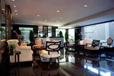 Luxurious modern living room with elegant furniture and large windows