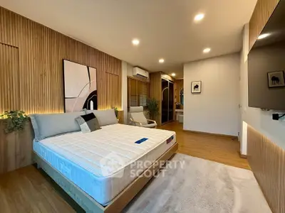 Luxurious modern bedroom with stylish wooden accents and ambient lighting