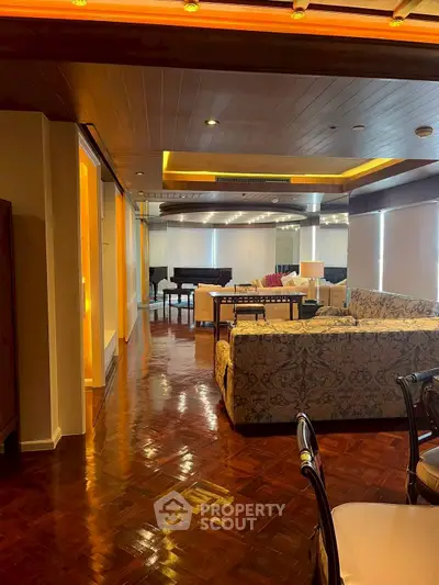Luxurious living room with elegant decor and grand piano, perfect for entertaining.