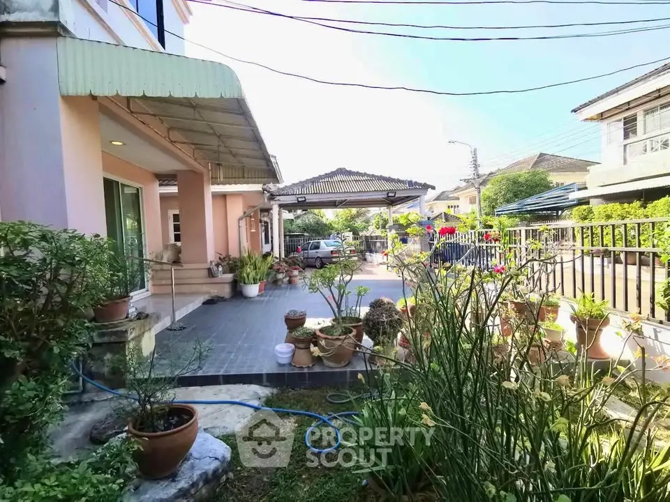 Charming suburban home with spacious garden and patio area, perfect for outdoor relaxation and entertaining.