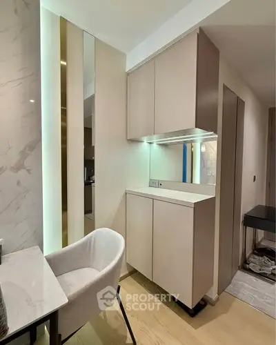 Modern kitchen corner with sleek cabinetry and elegant marble accents