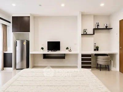 Modern bedroom with built-in desk and sleek decor