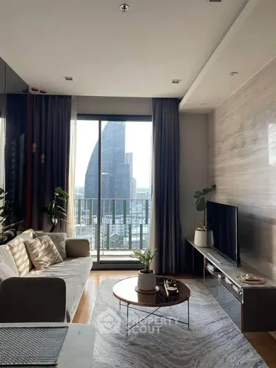 Modern living room with city view, stylish decor, and natural light