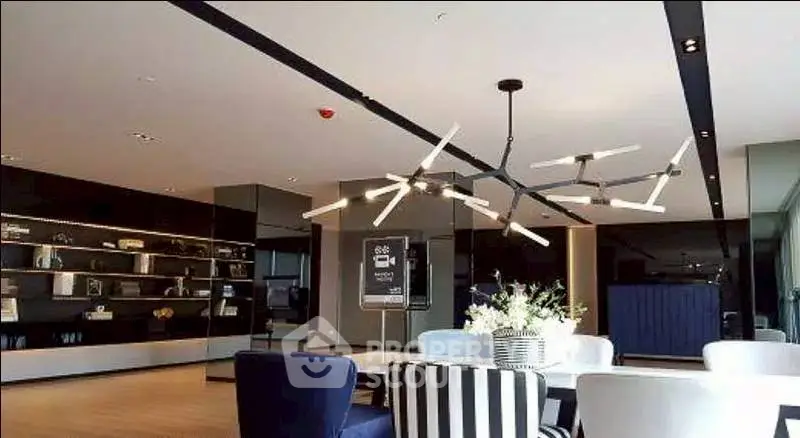 Modern living room with stylish chandelier and elegant decor