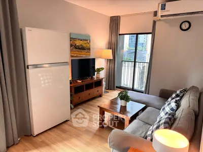 Cozy living room with modern decor and balcony view