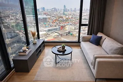 Modern living room with stunning city view from high-rise apartment
