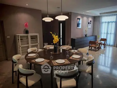 Elegant dining room with modern decor and stylish lighting, perfect for entertaining guests.