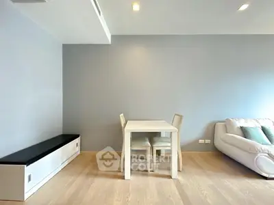 Modern living room with minimalist furniture and neutral tones