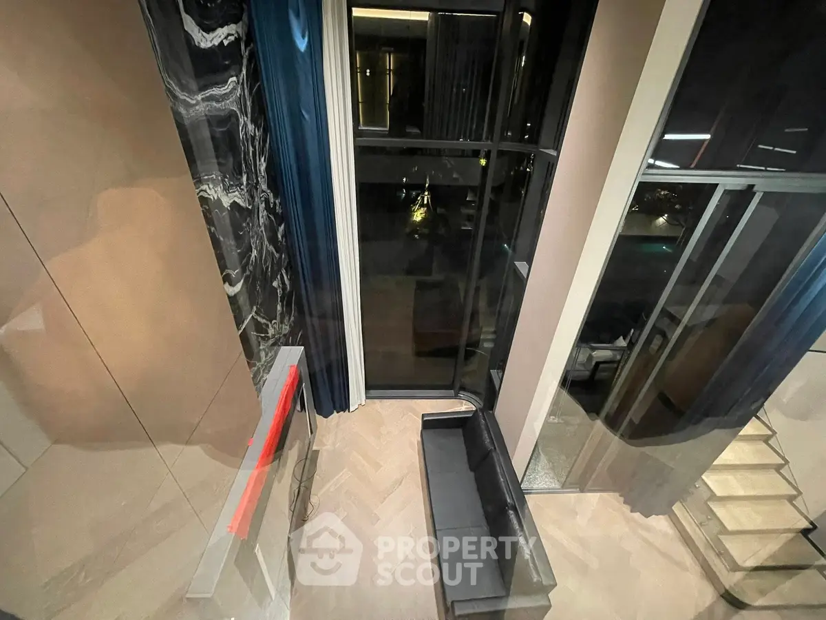 Luxurious modern living room with high ceilings and elegant decor