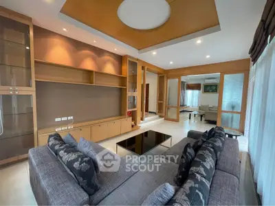 Spacious modern living room with elegant decor and ample natural light
