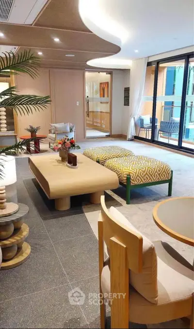 Luxurious modern living room with stylish furniture and elegant decor, perfect for relaxation and entertainment.