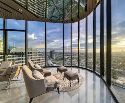 Stunning high-rise living room with panoramic city views and modern decor.