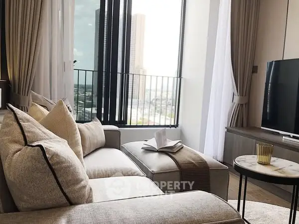 Chic modern living room with cozy sofa and city view from large windows.