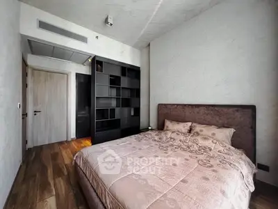 Cozy bedroom with elegant decor and modern furnishings in a stylish apartment.