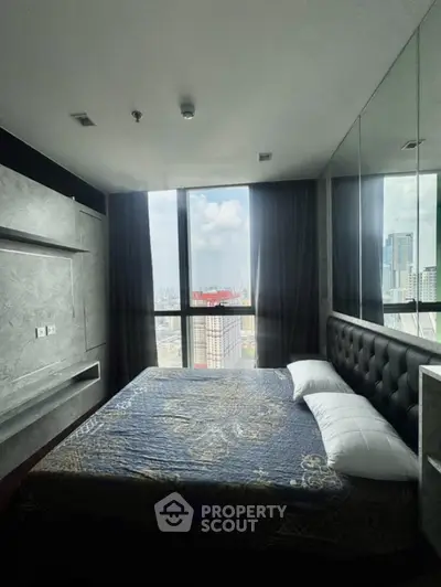 Luxurious bedroom with stunning city view and modern decor