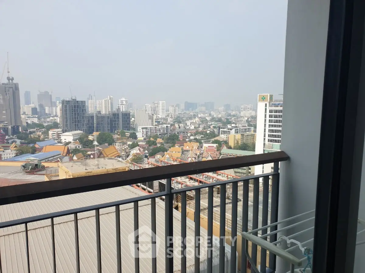 Stunning cityscape view from a high-rise balcony, perfect for urban living enthusiasts.