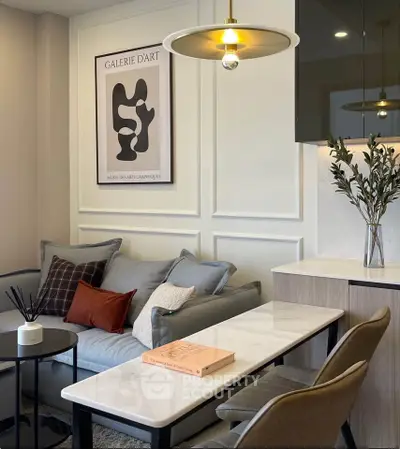 Stylish modern living room with elegant decor and cozy seating area.