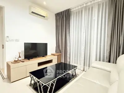 Modern living room with sleek furniture and natural light