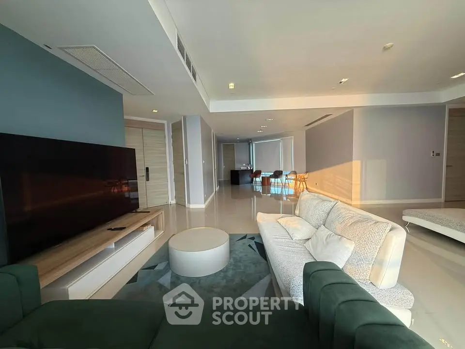 Spacious modern living room with stylish furniture and open layout