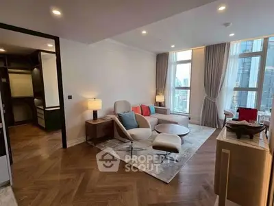 Luxurious modern living room with city view, elegant furniture, and natural light.