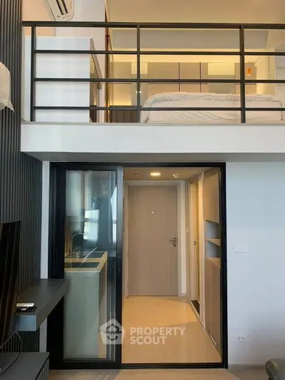Modern loft apartment with mezzanine bedroom and sleek interior design