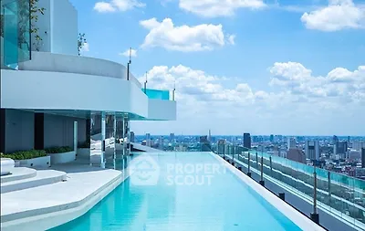 Luxurious rooftop infinity pool with stunning city skyline view