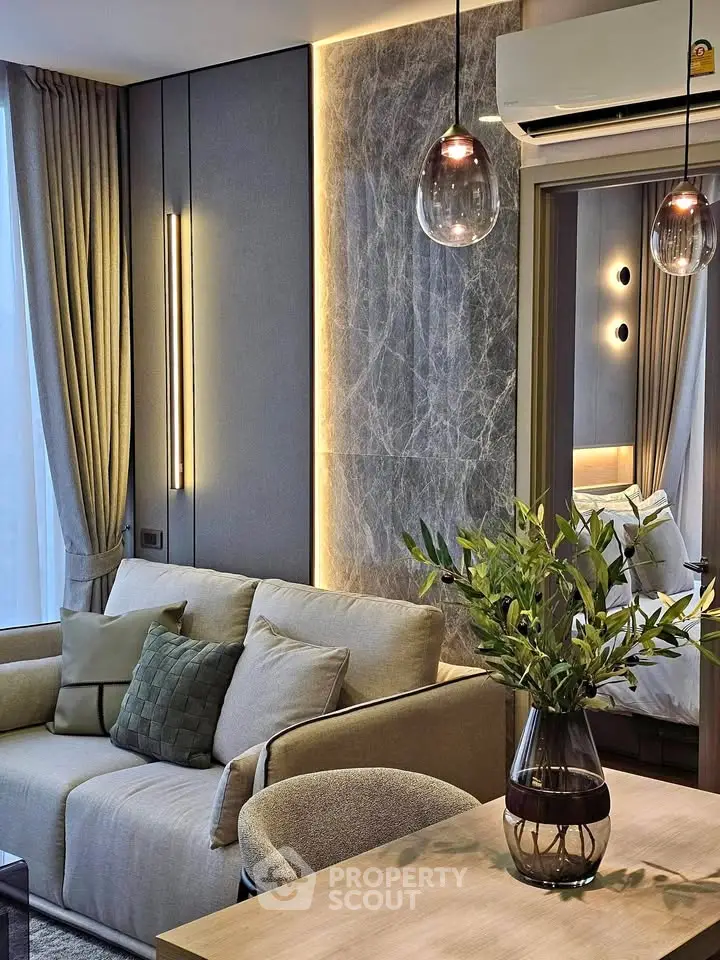 Luxurious modern living room with elegant lighting and stylish decor
