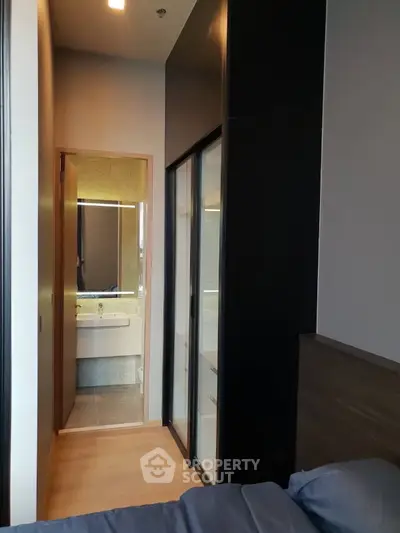 Modern bedroom with ensuite bathroom and sleek design