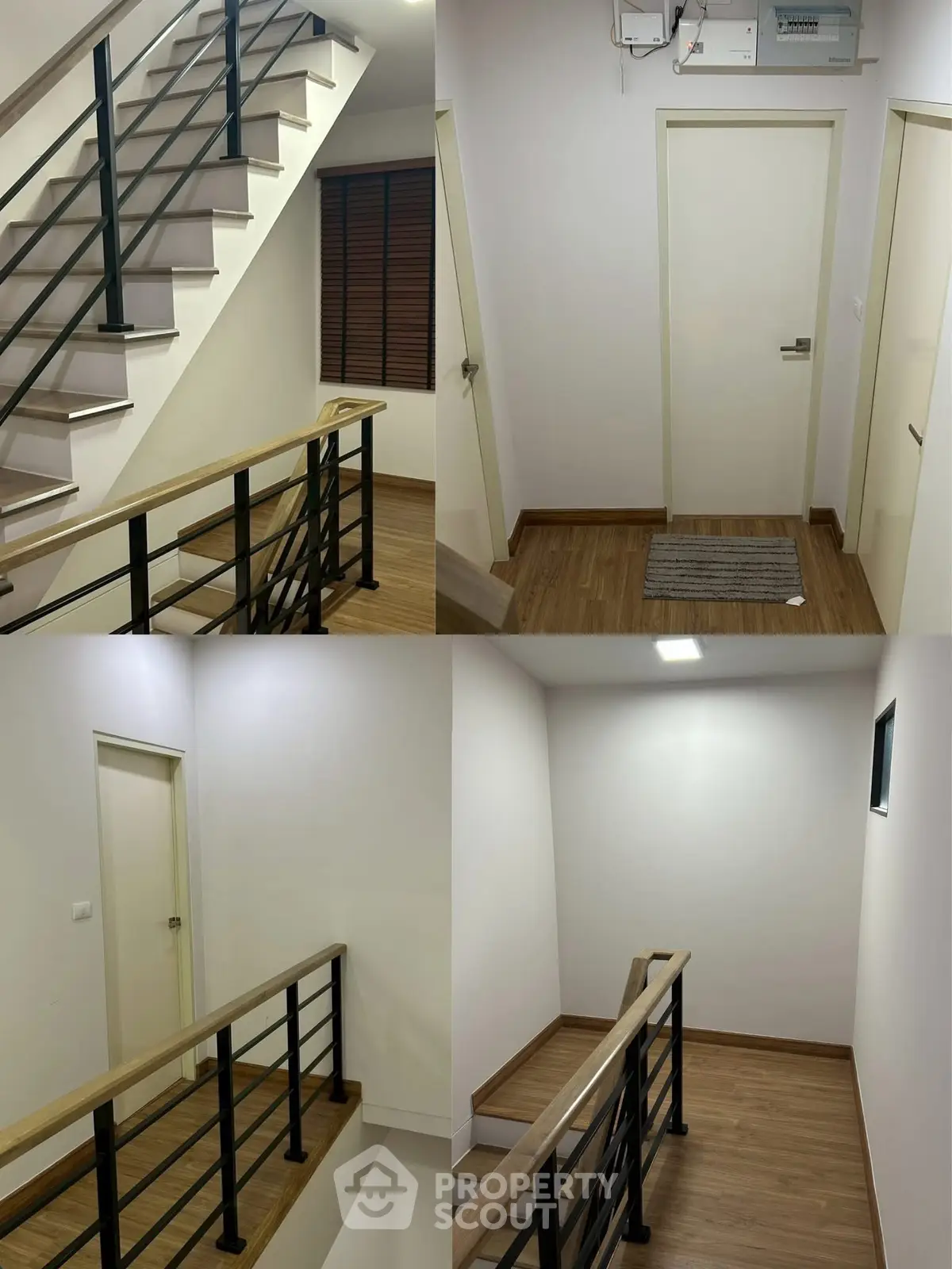 Modern interior staircase with sleek railing and wooden flooring in a contemporary home.