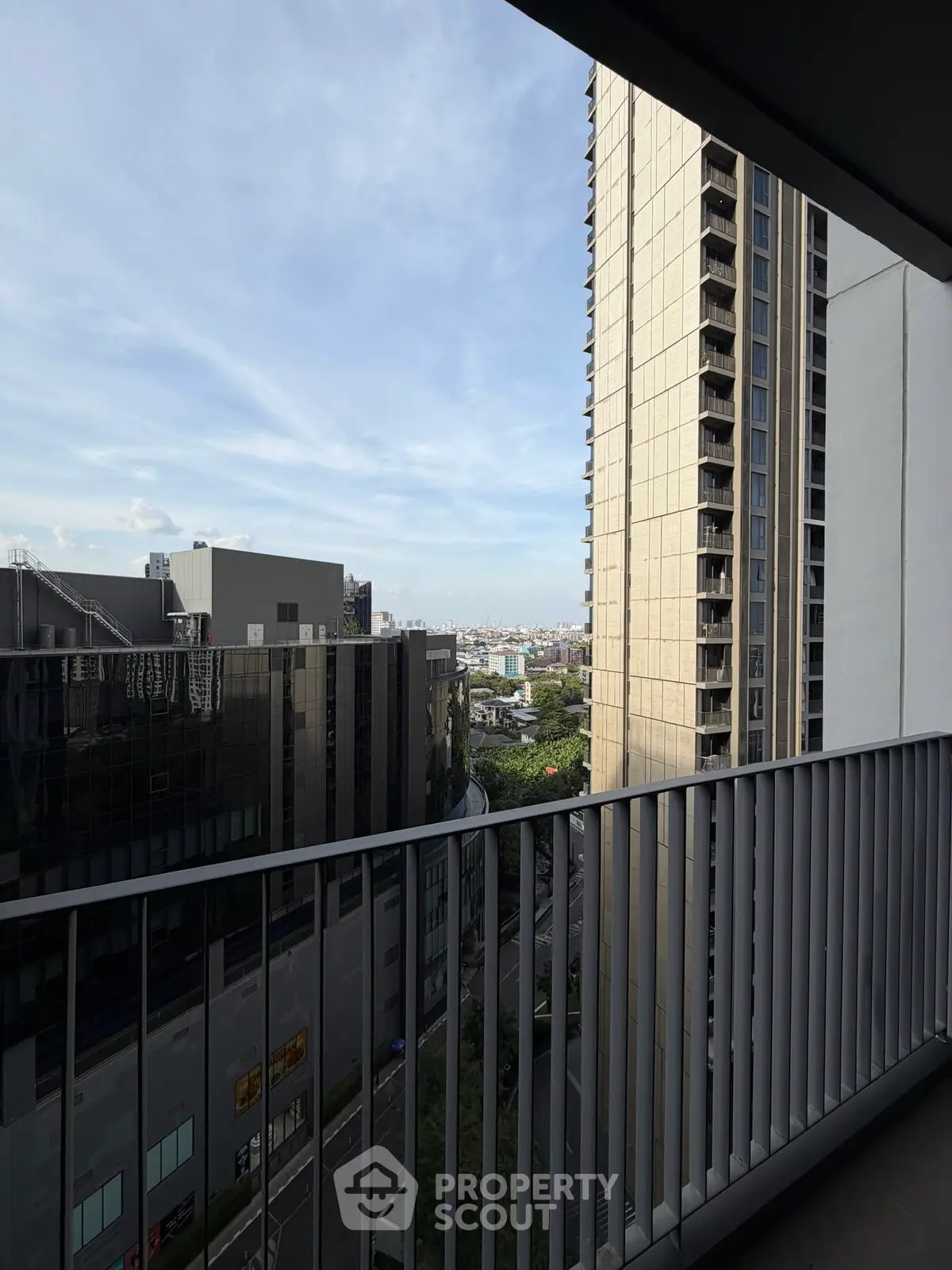 Stunning cityscape view from modern balcony in high-rise building