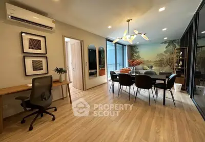 Spacious modern dining area with elegant decor and natural light