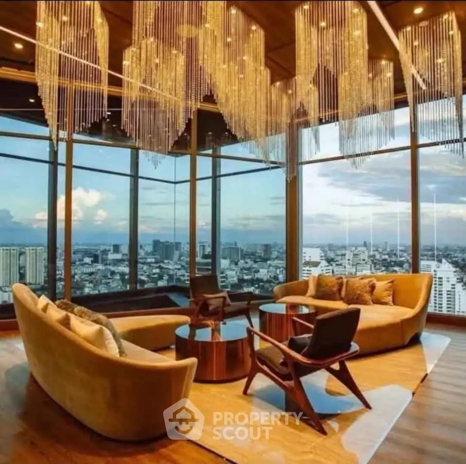 Luxurious living room with panoramic city view and elegant chandeliers