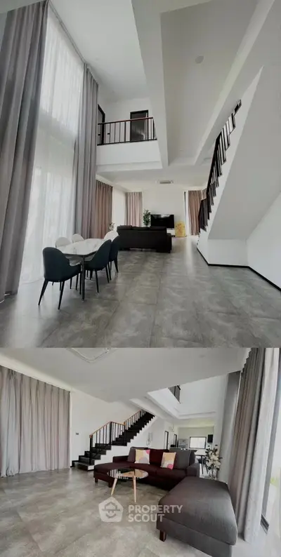 Spacious modern living room with high ceilings and elegant decor
