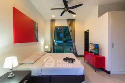 Modern bedroom with stylish decor and scenic window view