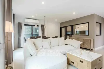 Spacious modern living room with elegant decor and natural light