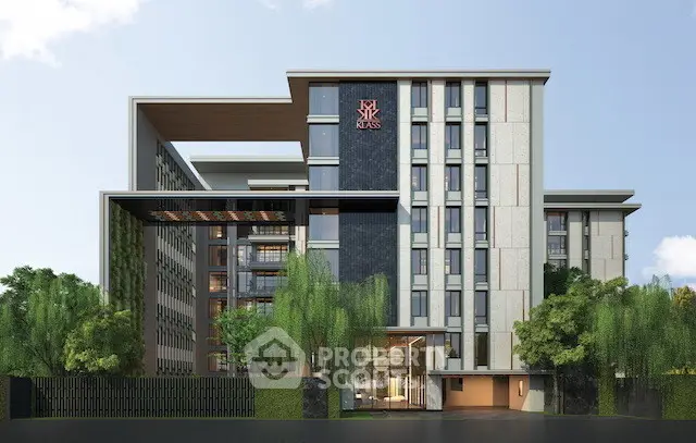 Modern architectural building with sleek design and lush greenery, ideal for urban living.