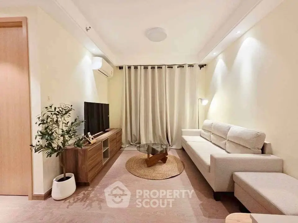 Cozy modern living room with elegant decor and neutral tones