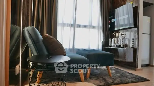 Modern living room with stylish furniture and natural light