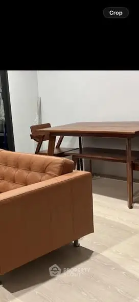 Modern interior with stylish furniture and wooden flooring