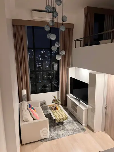 Luxurious modern living room with high ceilings and city view