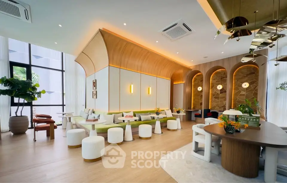 Luxurious modern living room with elegant decor and stylish lighting, perfect for sophisticated gatherings.